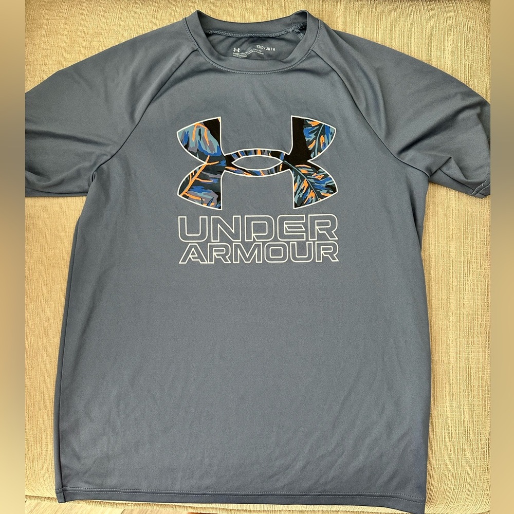 UA buys performance feel tee